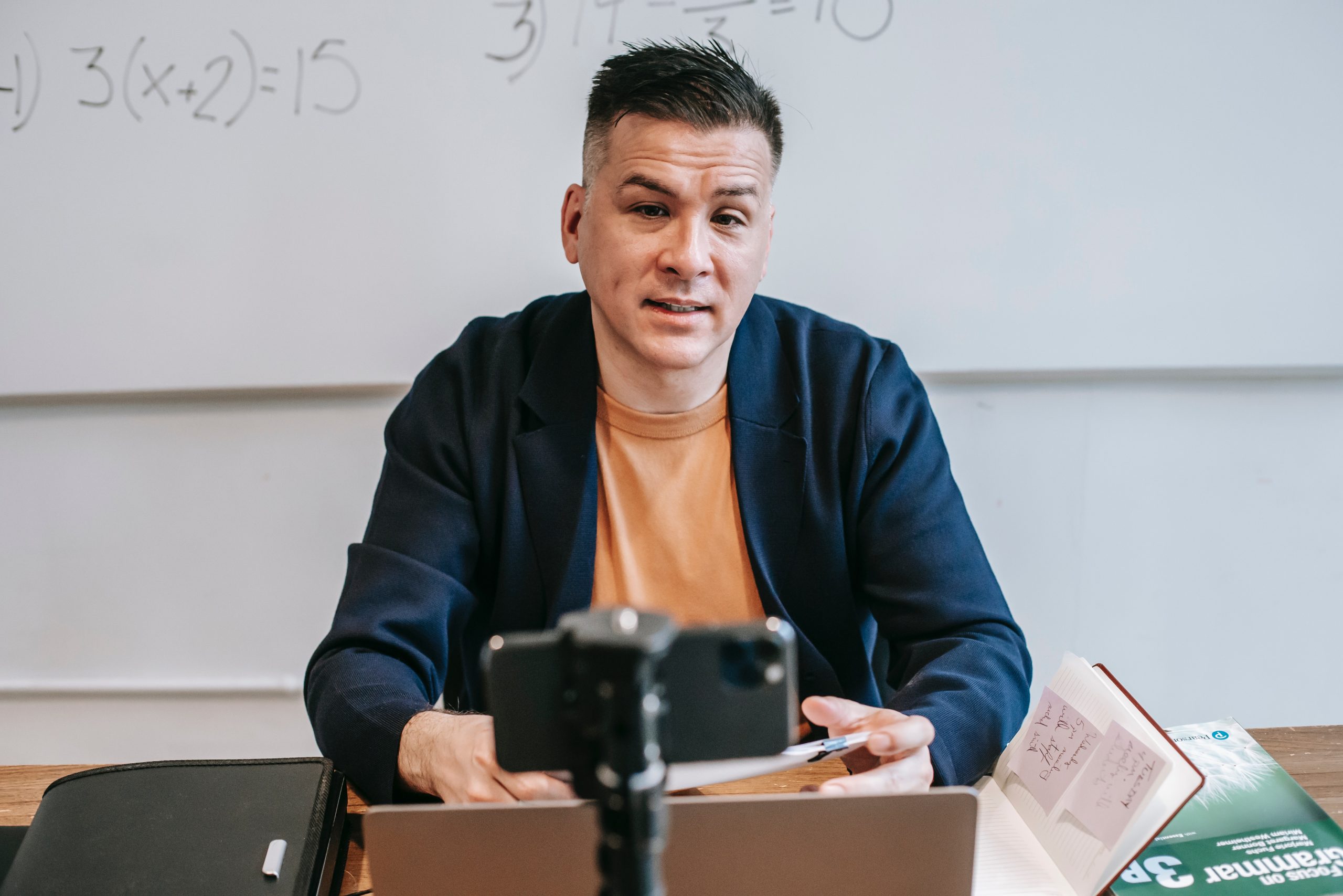 Picture of a Man Being Interviewed in Front of a Smartphone Camera