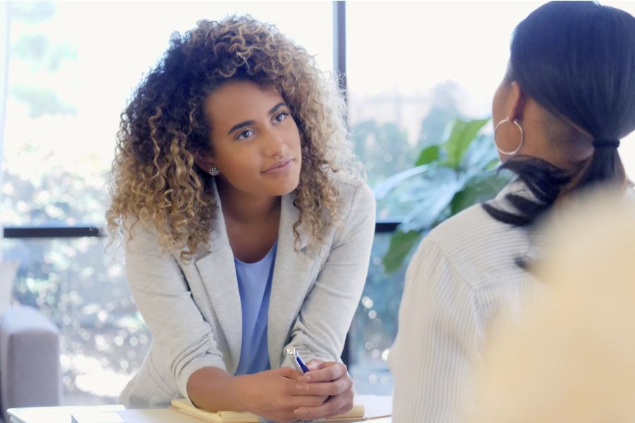 researcher listening to respondent